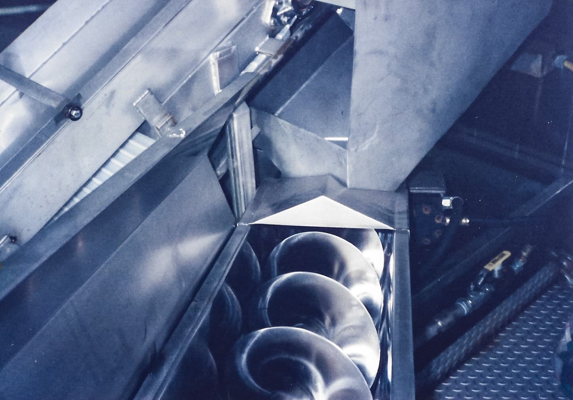 Hopper and auger transfer fabricated in-house