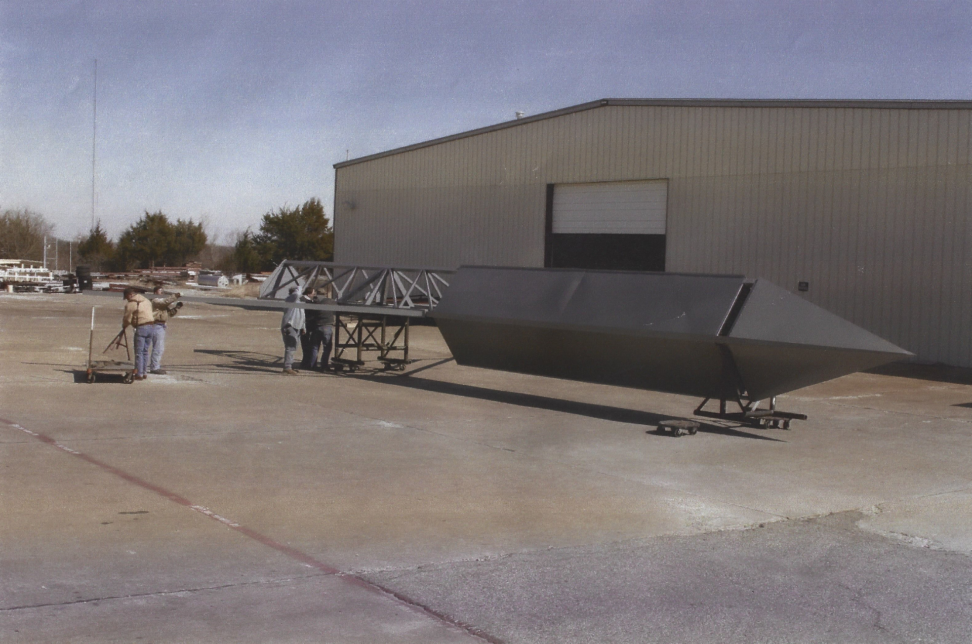 Finished hopper conveyor built by Mueller staged in the Sherman yard