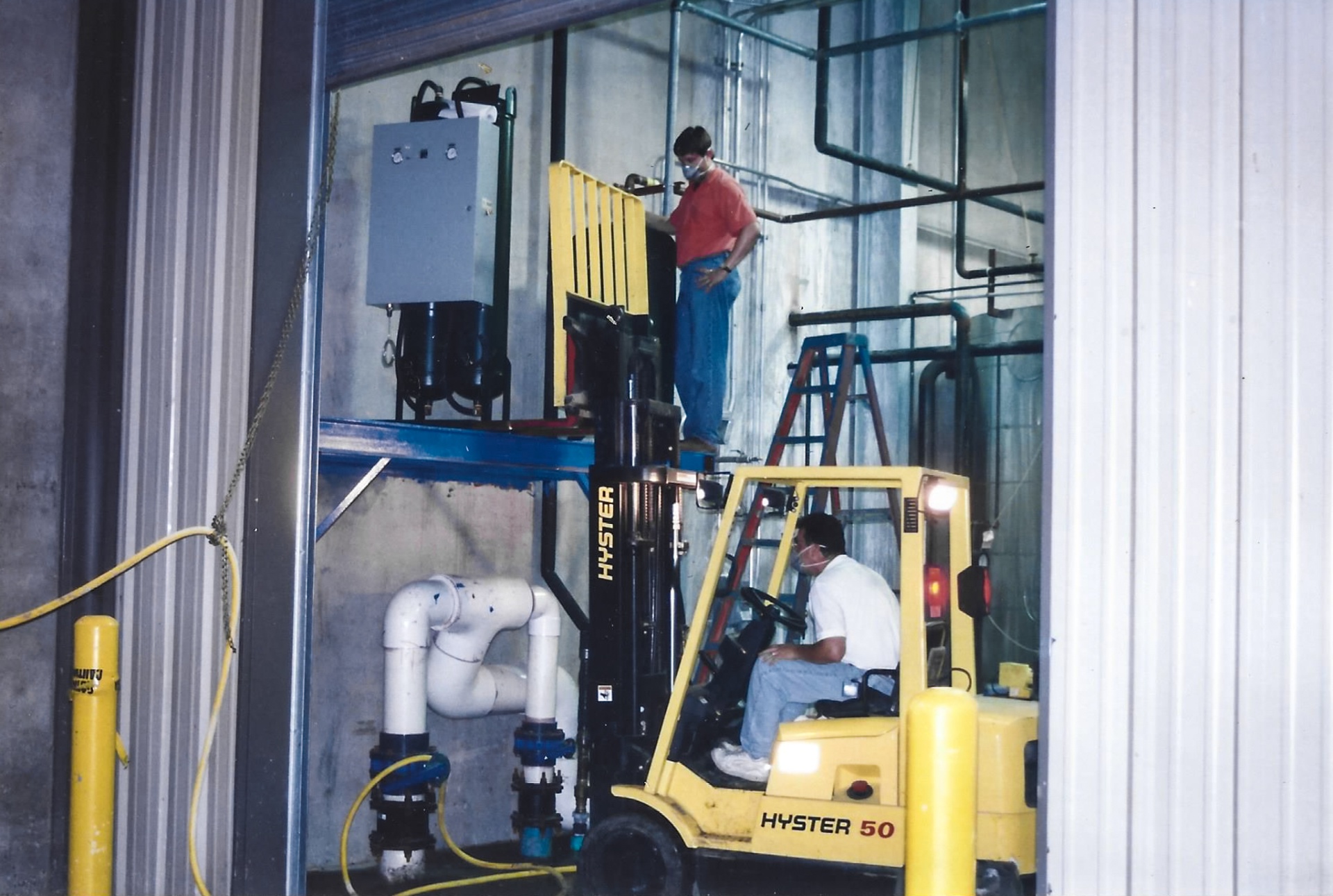 Process tank rigging and install — forklift placement